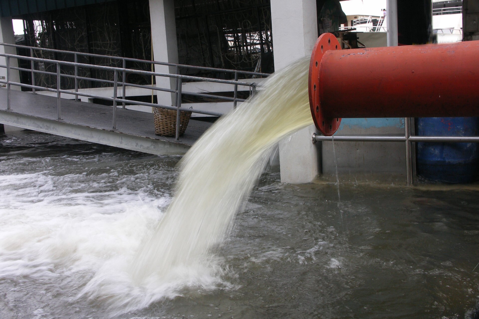 Flood prediction dashboard showing risk-coded water-utility assets on an interactive map