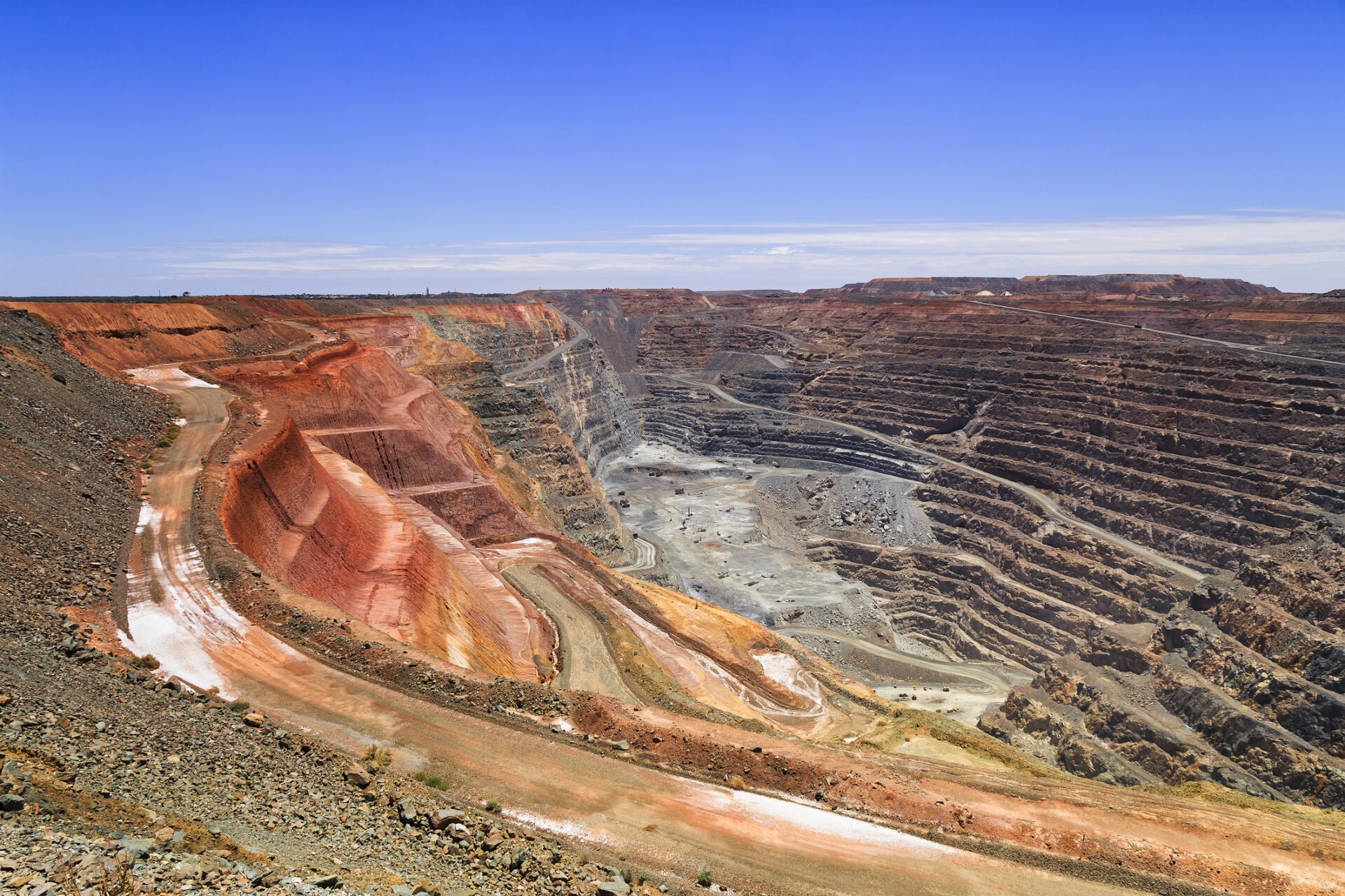 Aerial view of an open-pit iron ore mine operation
